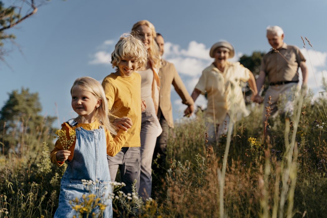 medium-shot-happy-family-nature